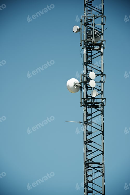 Preview: Telecommunications Tower With Clear Blue Sky.