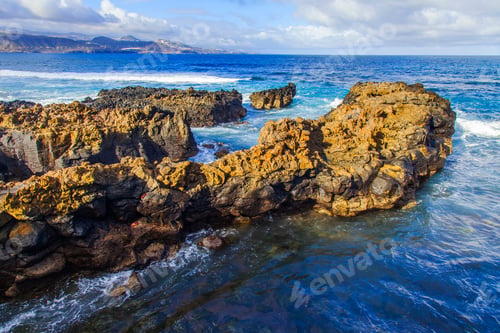 Preview: The Picturesque Rock At The Coast Of The Atlantic Ocean Is Washed By Waves