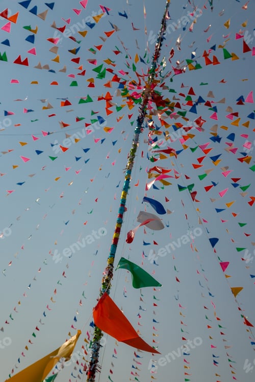 Preview: Multi-Color Triangle Pray Flags At Thai Celebration Festival With Cloud And Blue Sky Background