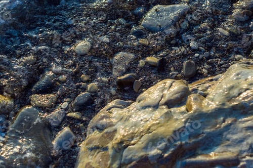 Preview: Pebble Stones On The Sea Beach, The Rolling Waves Of The Sea With Foam