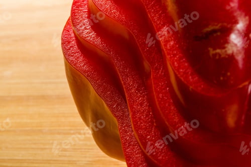 Preview: Stacked Pile Of Sliced Fresh Red Paprika, Bell Pepper On Bamboo Cutting Board
