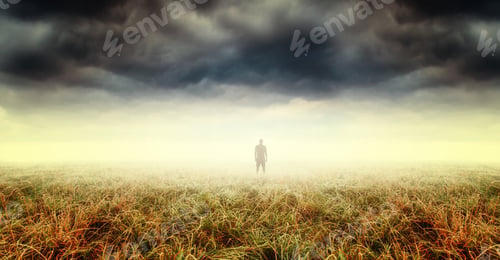 Preview: Silhouette Of Strange Man Standing In Distant Fog. Spooky, Surreal Landscape.