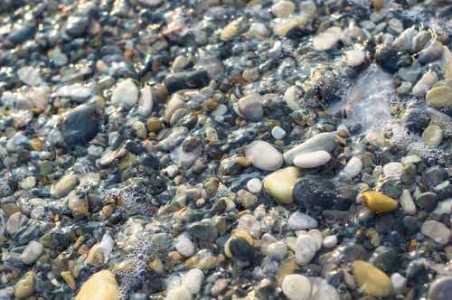 Preview: Pebble Stones On The Sea Beach, The Rolling Waves Of The Sea With Foam