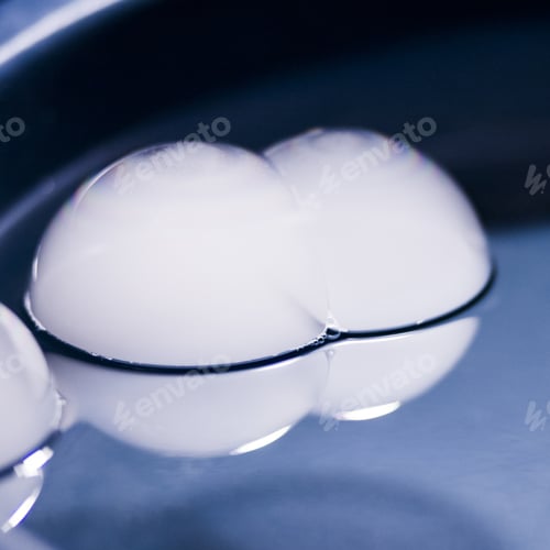 Preview: Abstract Shot With Big Soap Bubbles On A Water Surface With Smoke Inside. Image Has Grain Texture