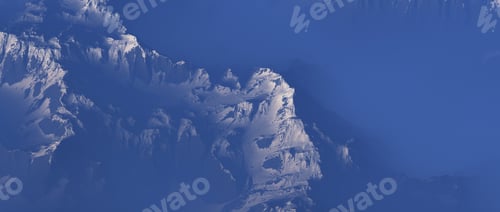 Preview: Snow Covered Mountains In Clouds. Aerial View.