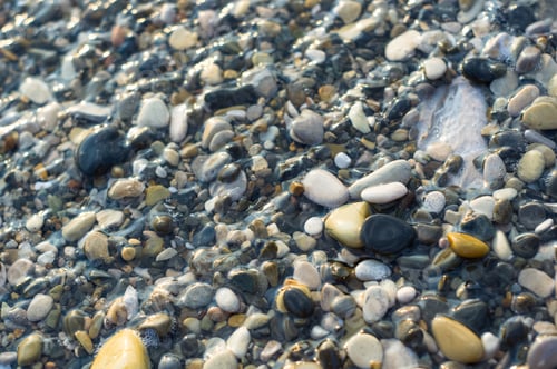 Preview: Pebble Stones On The Sea Beach, The Rolling Waves Of The Sea With Foam