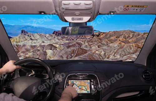 Preview: Driving A Car While Using The Touch Screen Of A Gps Navigation System Towards Zabriskie Point