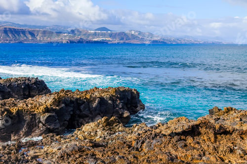 Preview: The Picturesque Rock At The Coast Of The Atlantic Ocean Is Washed By Waves