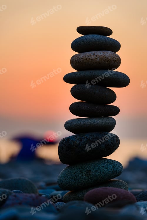 Preview: Stones Pyramid On Sand Symbolizing Zen, Harmony, Balance. Black Sea At Sunset In The Background.