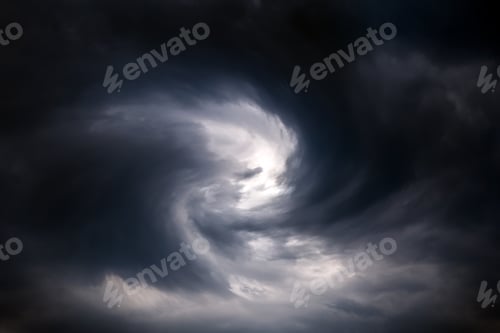 Preview: Blurred Swirl In The Dark Storm Clouds