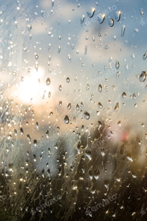 Preview: Raindrops On Window Glass On Background Of Cloudy Sky