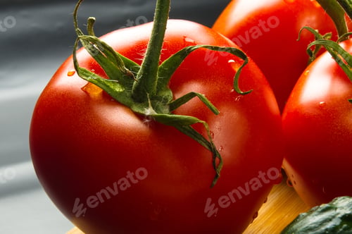 Preview: Still Life - Tomatoes On Twig, Cucumbers, Lettuce And Cilantro On A Wooden Board