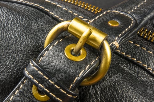 Preview: Closeup Of Buckles, Clasps, Zippers, Pockets, Fasteners, Fittings And Seams On Black Leather Hand