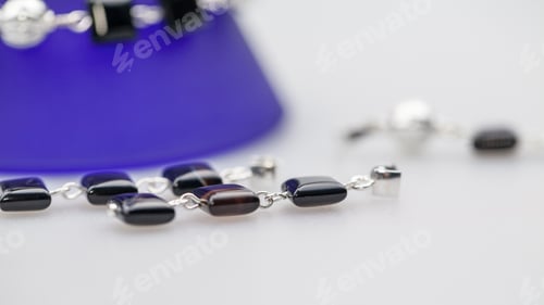 Preview: Silver Jewels With Colorful Precious Stones And Light Grey Background