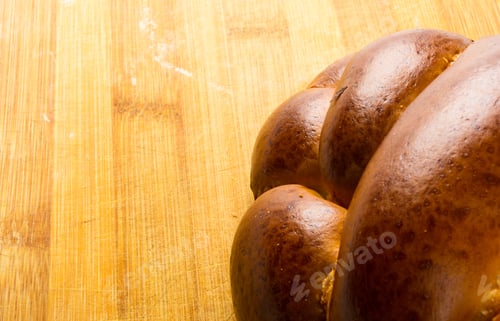 Preview: Chunks Large Braided Loaf On Wooden Background