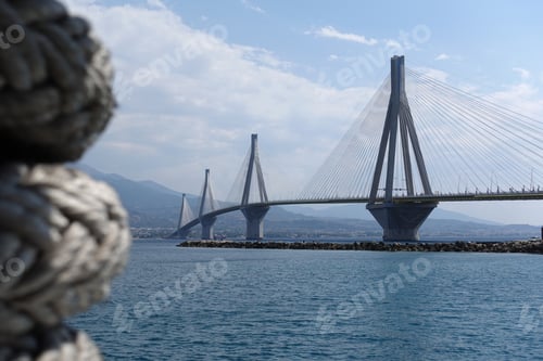 Preview: Famous Rio Antirio Suspension Bridge With Bokeh Effect As Seen From Boat Crossing Corinthian Gulf