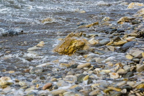 Preview: Pebble Stones On The Sea Beach, The Rolling Waves Of The Sea With Foam