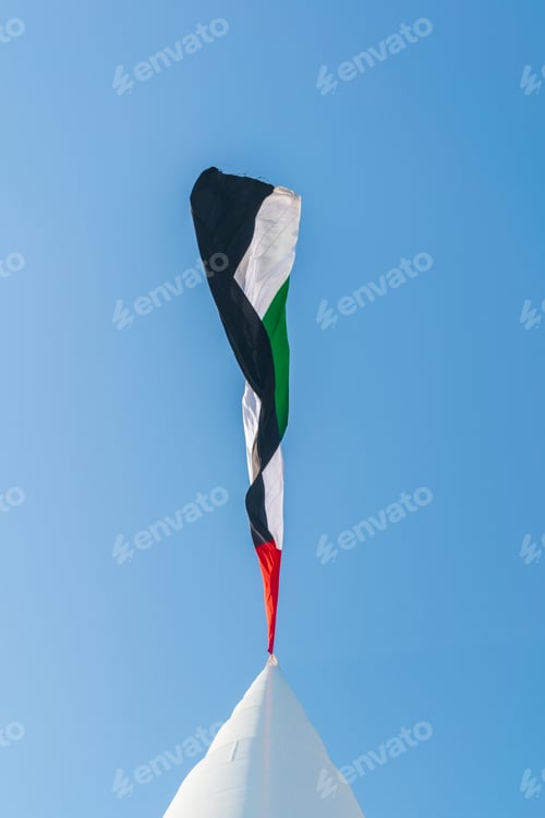 Preview: Emirates Flag Waving Against Clean Blue Sky
