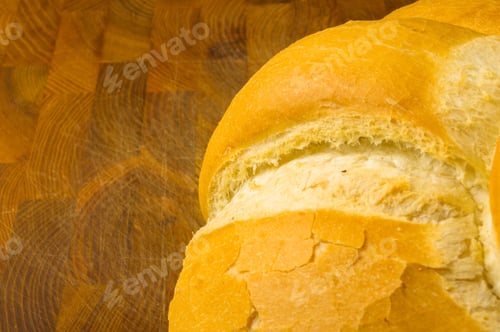 Preview: Fresh Braided Loaf Of White Wheat Bread On Wooden Background