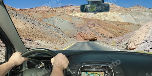 Preview: Driving A Car In Towards A Isolated Road Among The Rocks In Death Valley, California, Usa