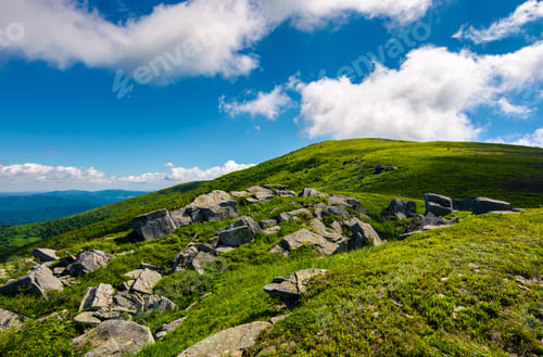 Preview: Huge Rocky Formation On The Grassy Hillside. Beautiful Landscape Of Runa Mountain On A Bright