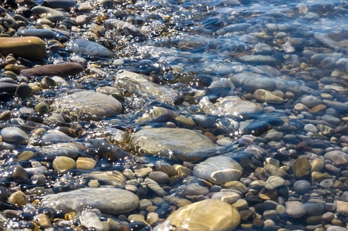 Preview: Sea Pebble Beach With Multicoloured Stones, Transparent Waves With Foam, On A Warm Summer Day