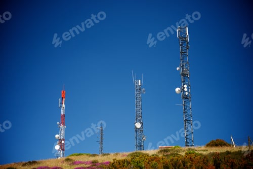Preview: Telecommunications Towers With Clear Blue Sky.