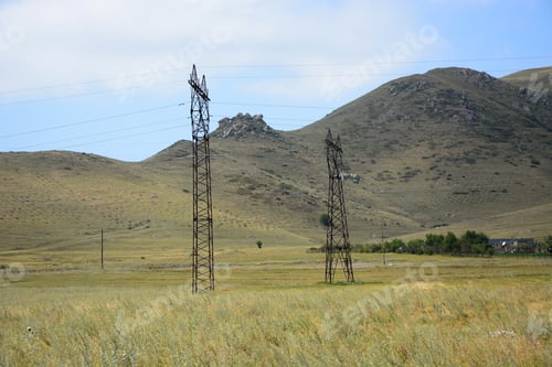 Preview: Landscape With Transmission Towers