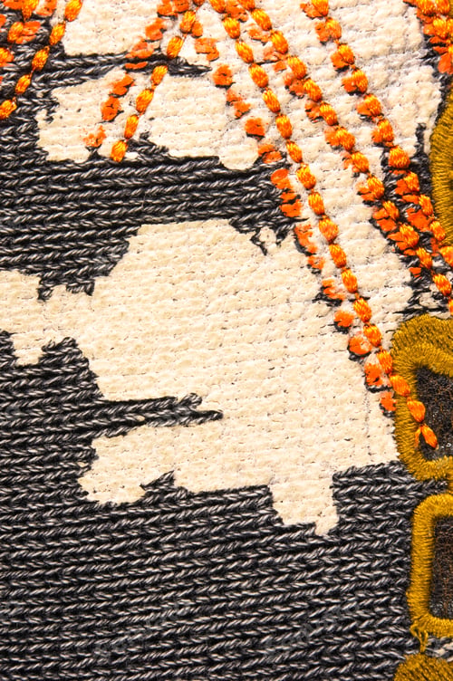 Preview: Texture Of A Washed Thick Knit Fabric, With Decorative Elements, Seams And Stitching, Close-Up