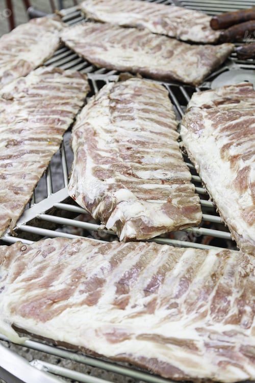 Preview: Roast Ribs On A Grill, Detail Of Roast Pork With Coal