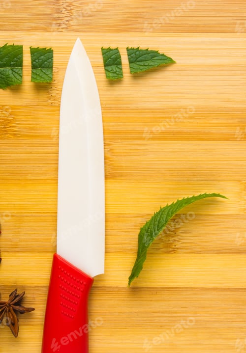 Preview: Fresh Spearmint Herb Mentha And Knife On A Wooden Background