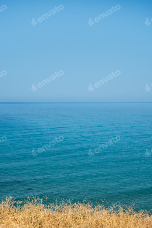 Preview: Blue Tranquil Calm Sea And Clear Blue Sky