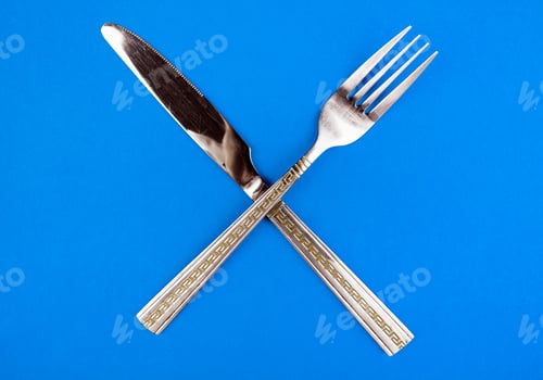 Preview: Cutlery On The Blue Paper Background Closeup