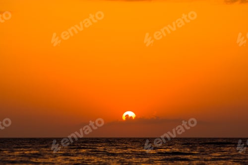 Preview: Amazing Sea Sunset On The Pebble Beach, The Sun, Waves, Clouds