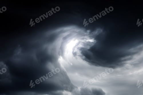 Preview: Blurred Swirl In The Dark Storm Clouds