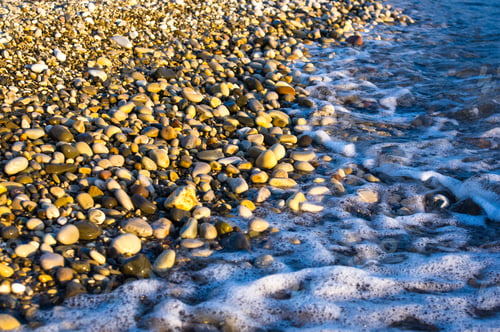 Preview: Sea Pebble Beach With Multicoloured Stones, Transparent Waves With Foam, On A Warm Summer Day