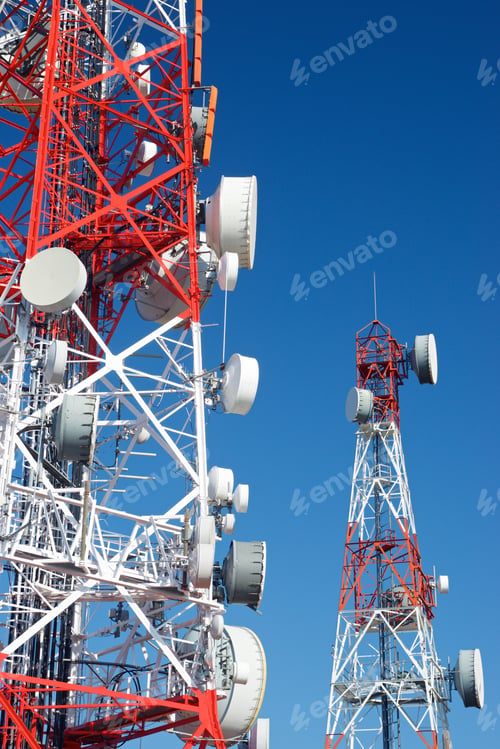 Preview: Telecommunications Towers With Clear Blue Sky.