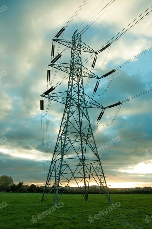 Preview: Power To The Skies. An Electricity Pylon In The Sunset Landscape Of England.
