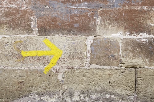 Preview: Yellow Arrow On A Wall, Detail Of A Signal Information