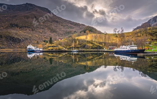Preview: Large Passenger Ferry And Small Boat Anchored In Harbor On The Shore In Small Village Flam, Norway