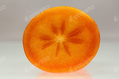 Preview: Persimmon Halves With Light Grey Background
