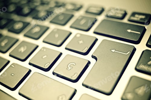 Preview: Forefront Of A Gray Laptop Keyboard.