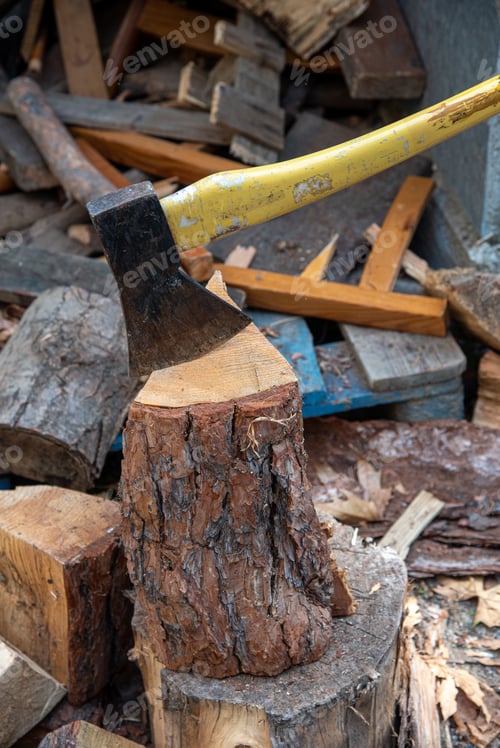 Preview: Axe With Sharp Blade To Cut Wood And Use In A Fireplace For Heating During Wintertime