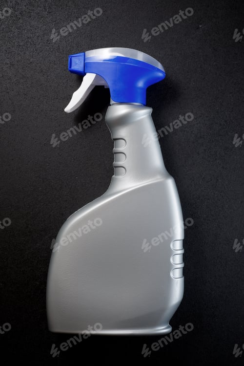 Preview: Household Cleaning Product Canister On A Black Table.