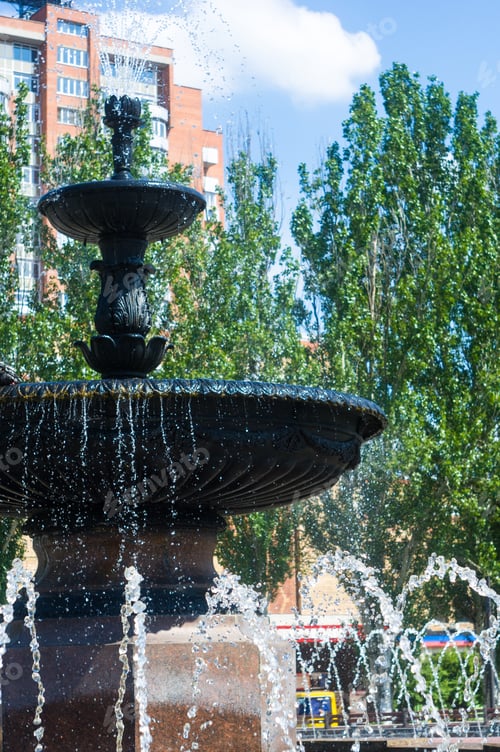 Preview: Fountain In City Park On Hot Summer Day