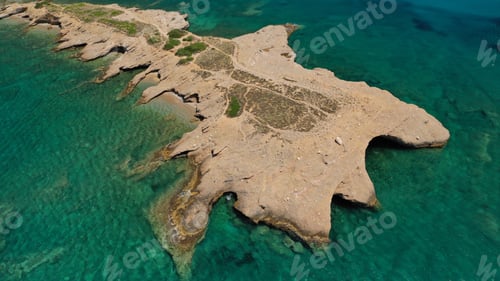Preview: Aerial Photo Of Not So Famous Akrotiri Lovardas Beach And Small Islet With Caves And Clear