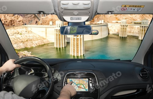 Preview: Driving A Car While Using The Touch Screen Of A Gps Navigation System Towards Hoover Dam And