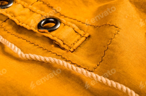 Preview: Clothing Items Stonewashed Cotton Fabric Texture With Seams, Clasps, Buttons And Rivets, Macro