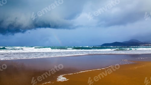 Preview: Surf Waves At The Coast Of The Atlantic Ocean In Cloudy Weather