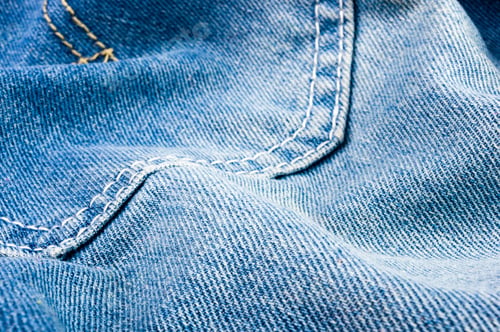 Preview: Clothing Items Blue Stonewashed Faded Jeans Cotton Fabric Texture With Seams, Clasps, Buttons And